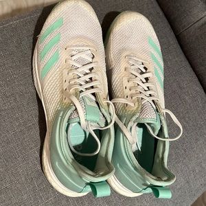 Adidas volleyball shoes.  Women’s 9.  Some wear but worn with different insoles